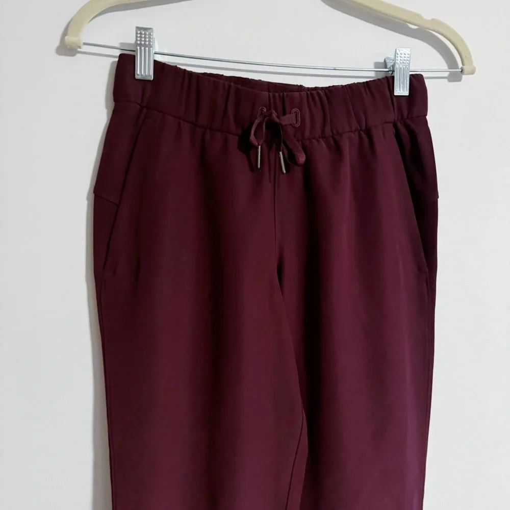Lululemon - Burgundy On The Fly Woven Jogger Pants